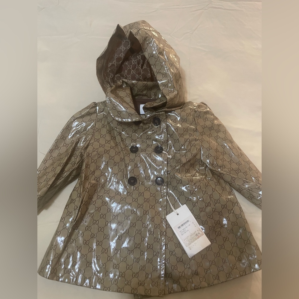 Gucci baby rain coat 6-9 months